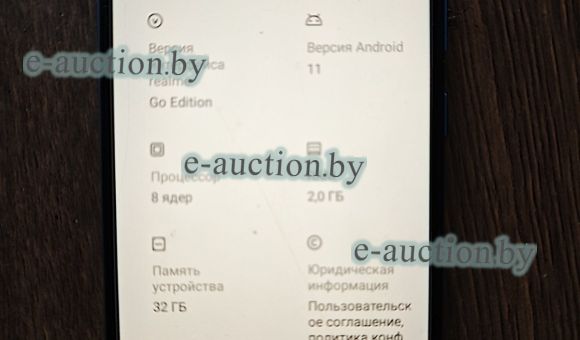 Мобильный телефон REALMI