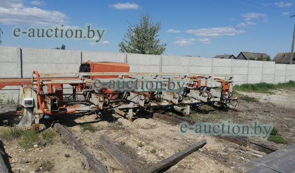 Торцовочный станок проходного типа СТП 6000