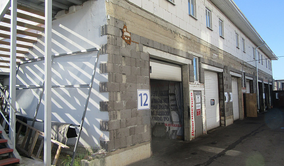 Здание пункта технического обслуживания автомобилей вблизи д. Богатырево (Минский район), площадью 460.5 м²